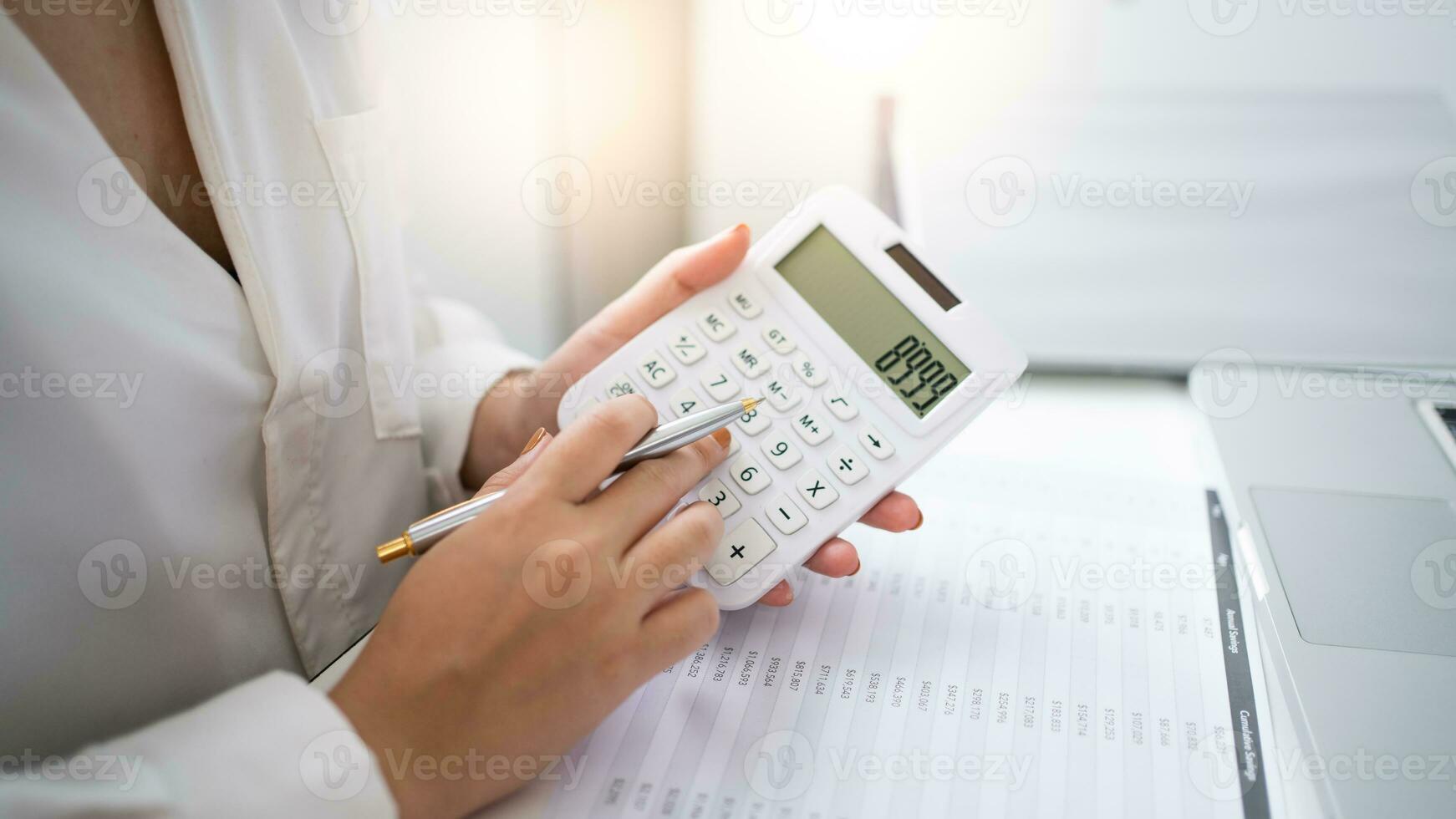 Business woman Accountant investment risk analysis. saving money for Stock market trading with calculator. Accountancy Concept. photo