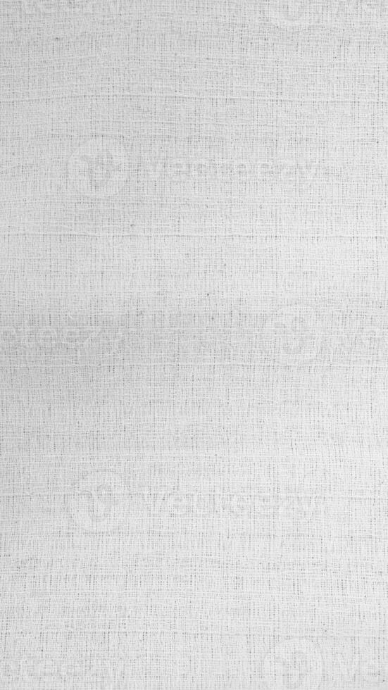 Organic Fabric cotton backdrop White linen canvas crumpled natural cotton fabric Natural handmade linen top view background  organic Eco textiles White Fabric linen texture photo