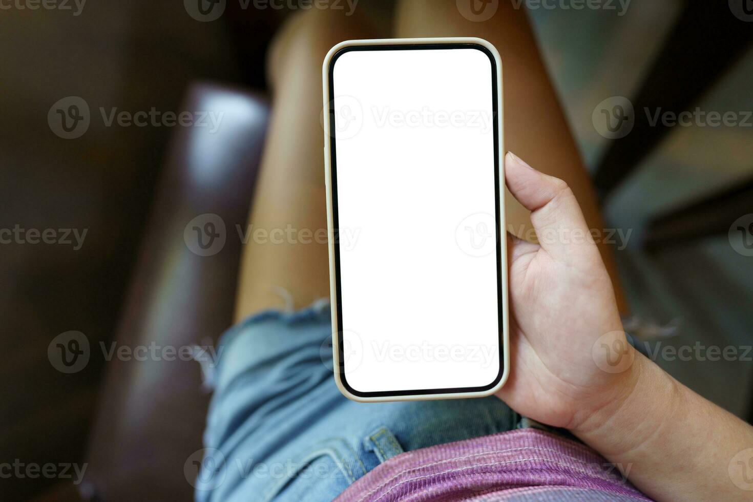 Close up of women's hands holding cell telephone blank copy space screen. smart phone with technology concept photo