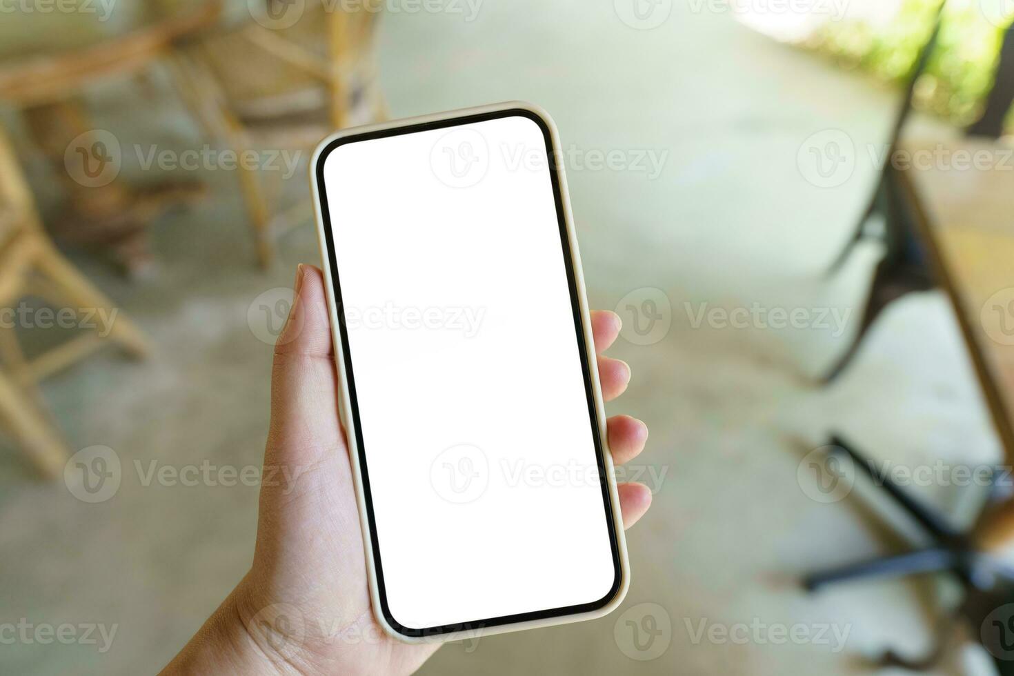 Close up of women's hands holding cell telephone blank copy space screen. smart phone with technology concept photo