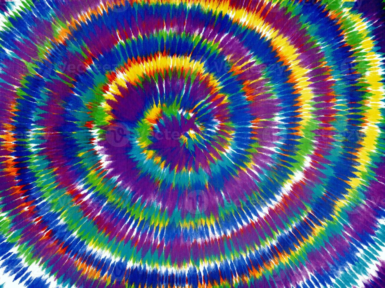 Orange tie dye pattern. Spiral tie-dye texture background. Stock