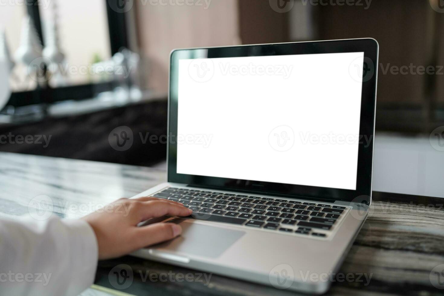 Laptop with Mock up blank screen on table in front of cafe space for text. product display computer laptop montage- technology concept photo