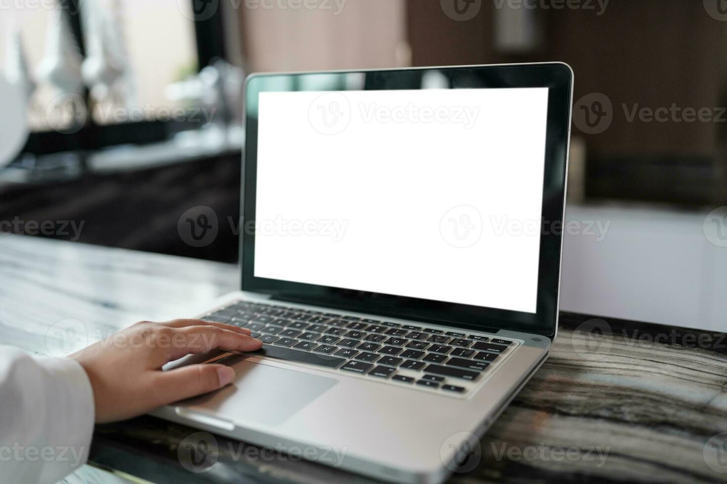 Laptop with Mock up blank screen on table in front of cafe space for text. product display computer laptop montage- technology concept photo