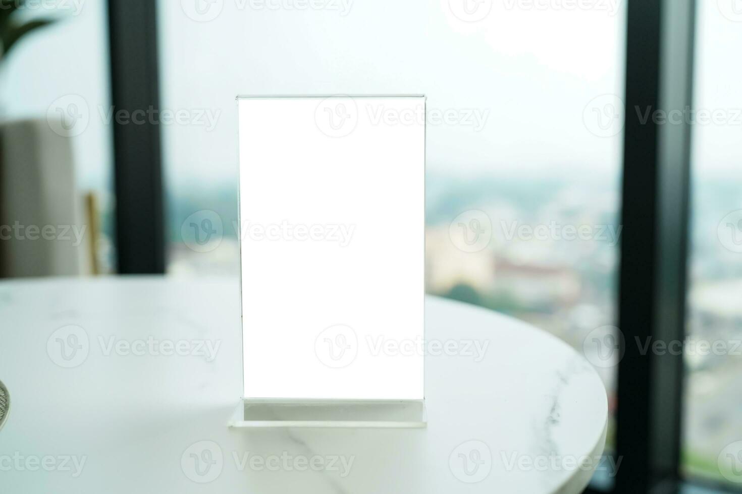 for text marketing promotion. Mock up Menu frame standing on wood table in restaurant space for text photo