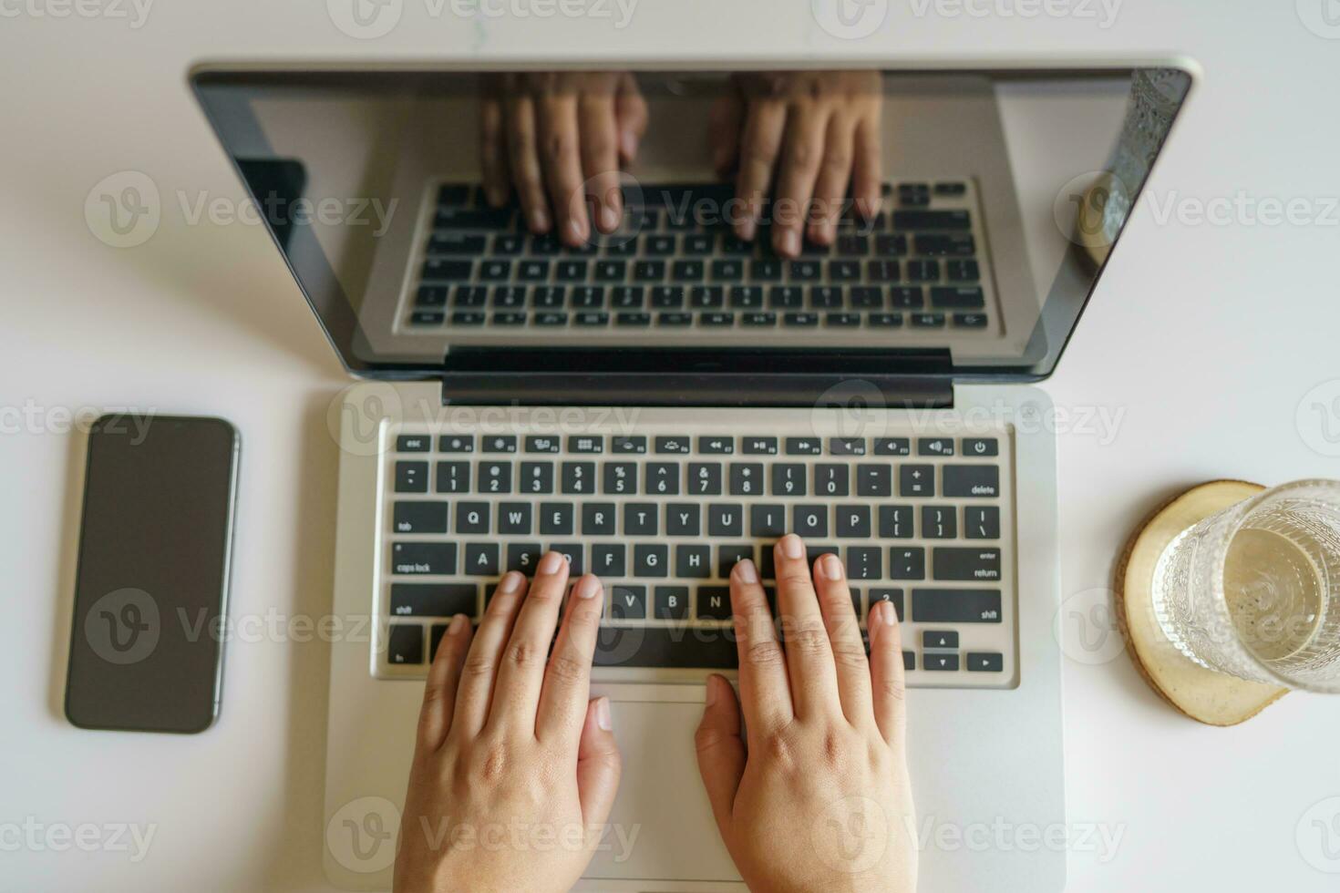 woman using computer laptop for work online at living room. photo