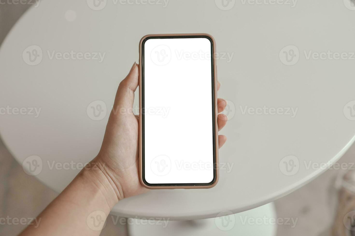 Women's hands holding cell telephone blank copy space screen. smart phone with technology concept photo