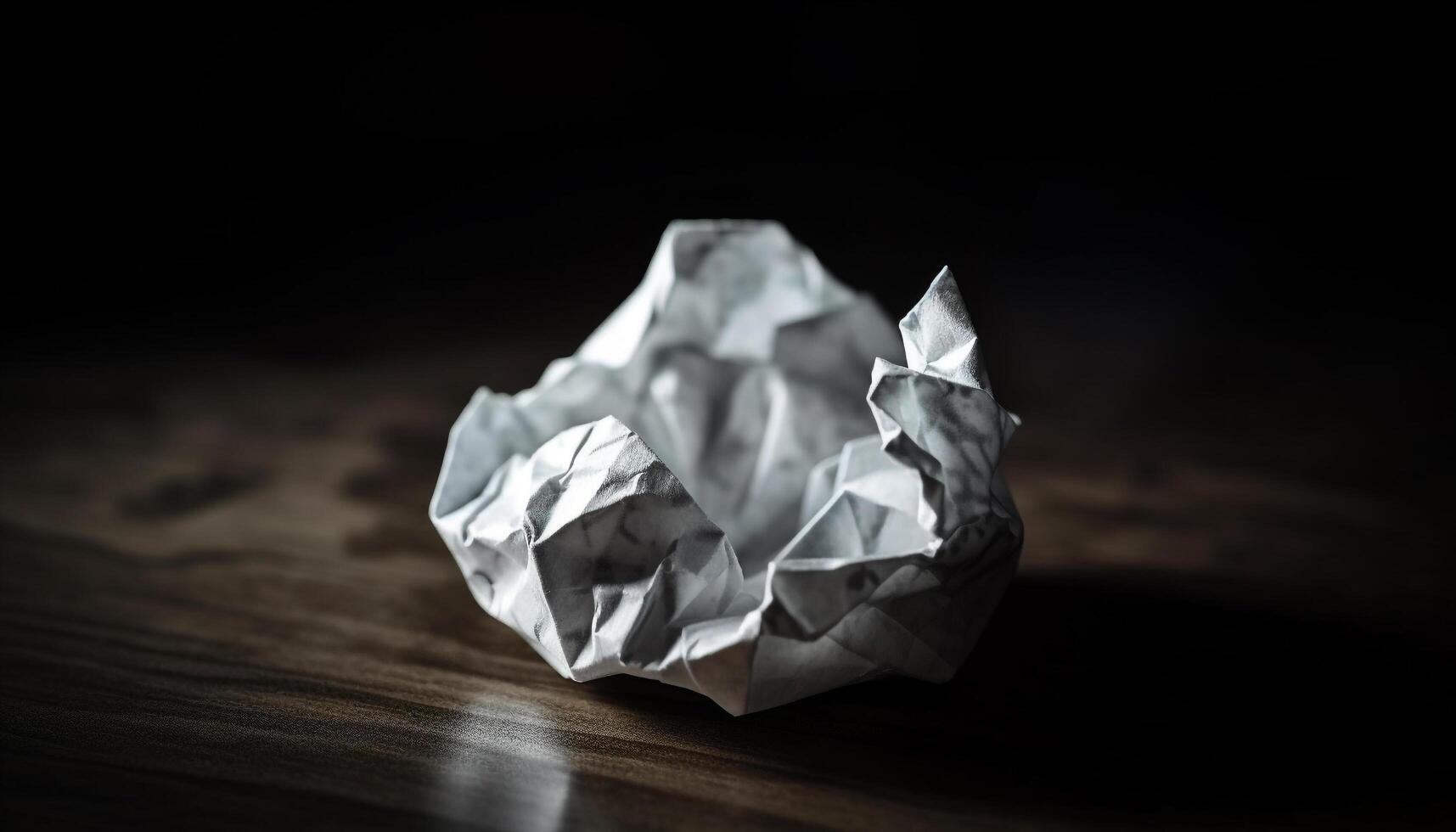 Rejected ideas crumpled into a ball, crushed by frustration generated by AI photo