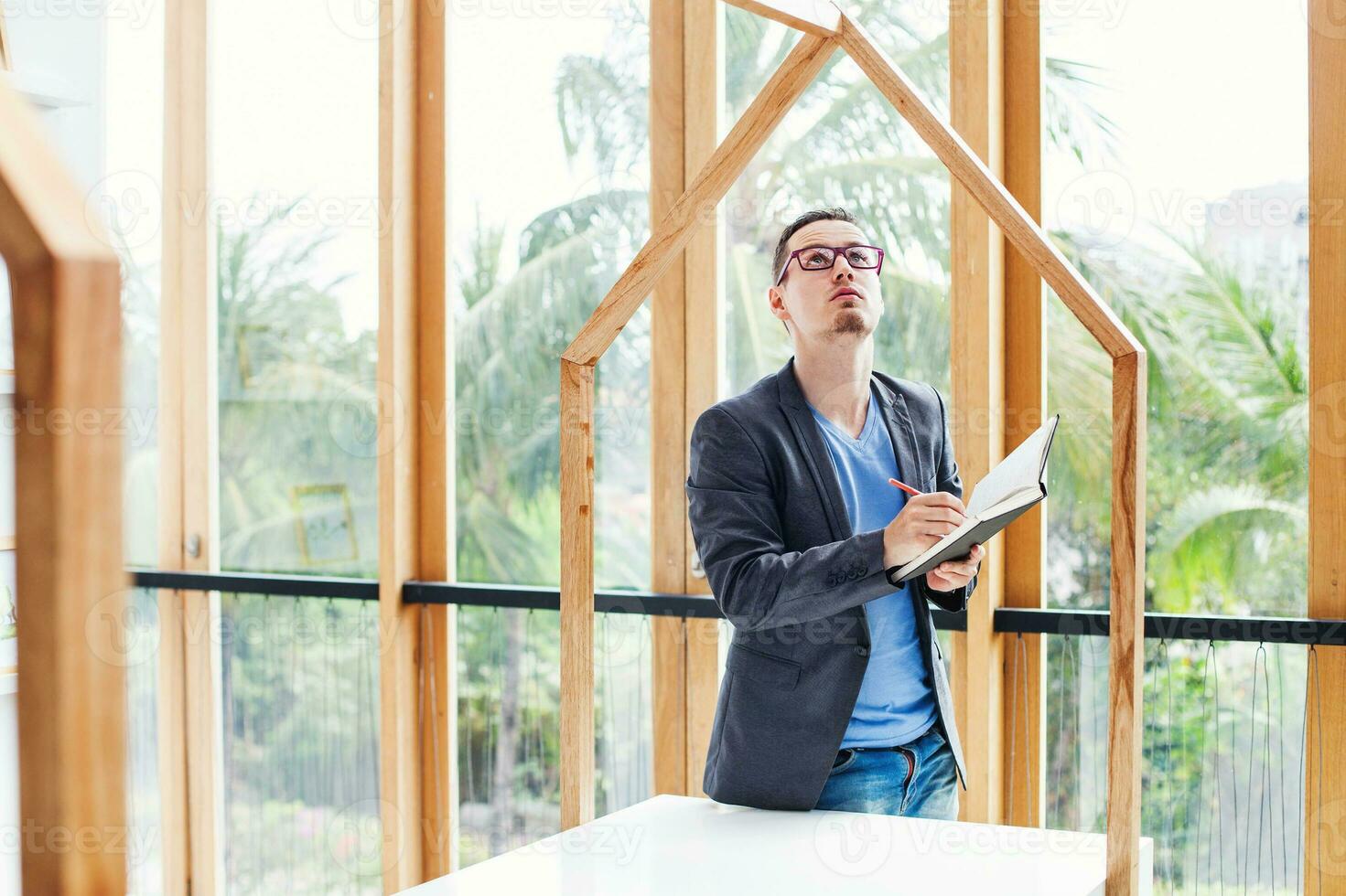 engineer checking the quality of house model photo