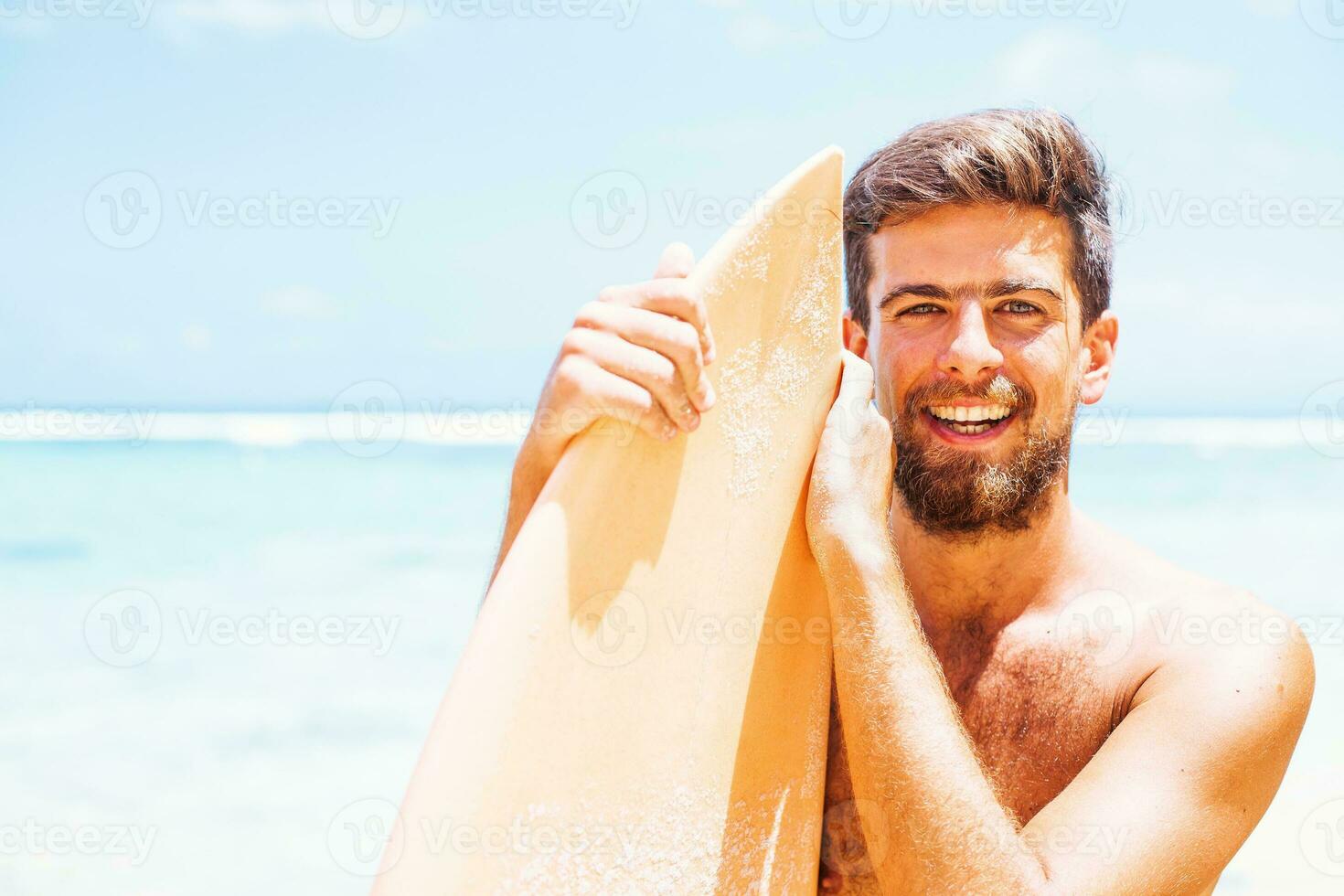 Young caucasian surfer photo