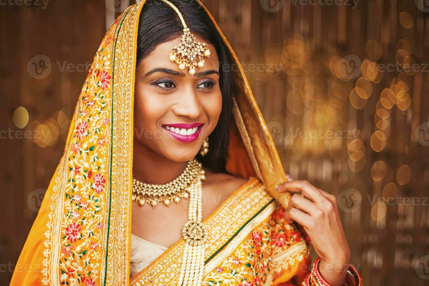 Beautiful Indian woman in traditional clothes photo