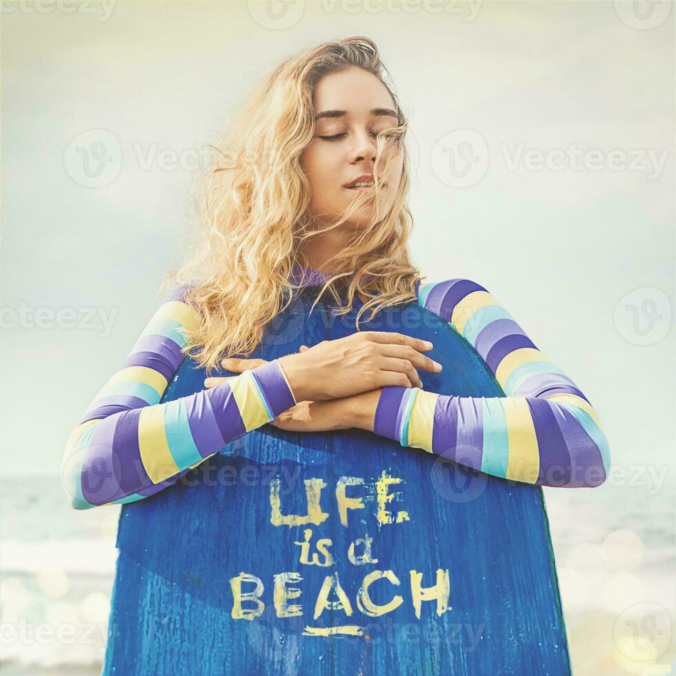 woman with a surfboard photo