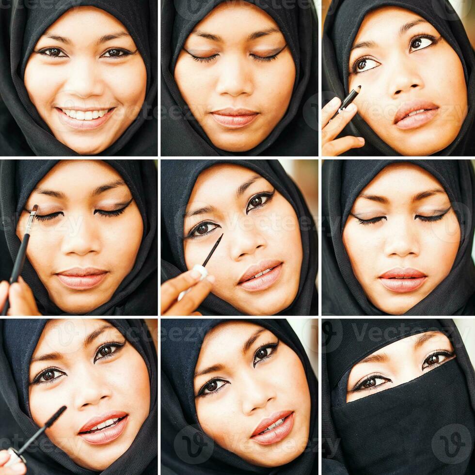 Woman in burka with make-up photo