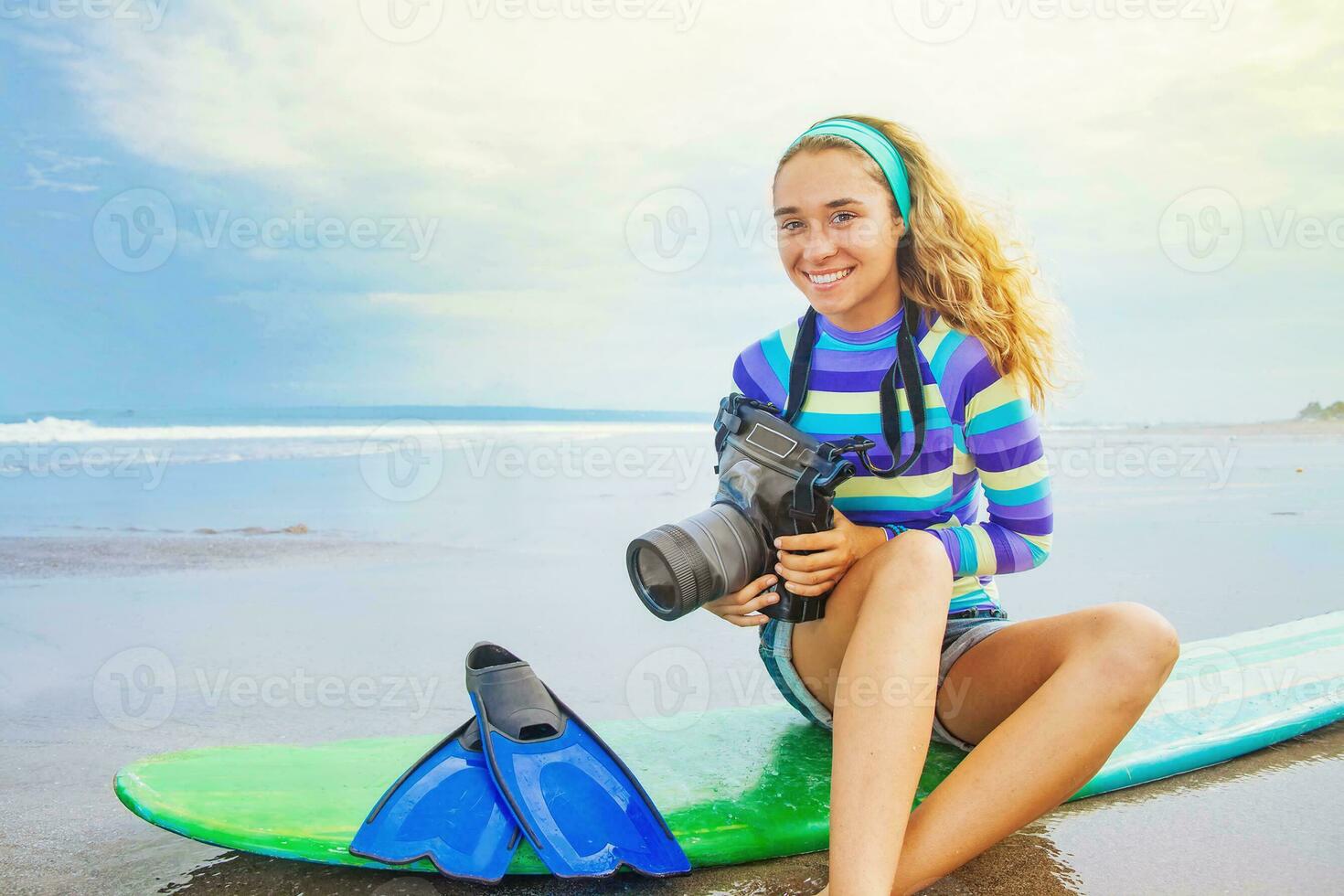 Lovely optimistic surf photographer girl photo