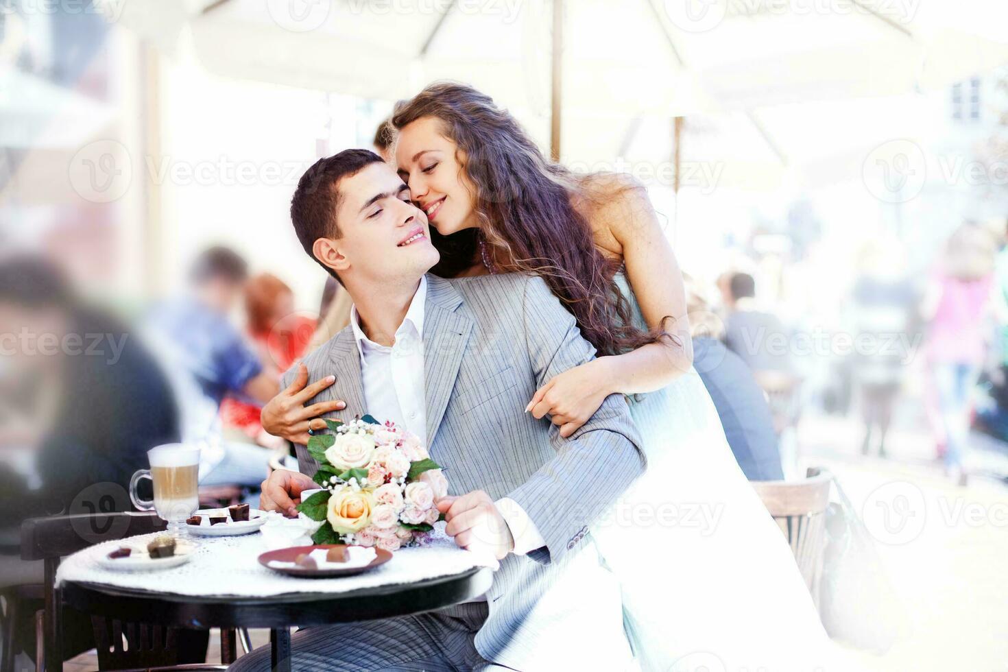 couple in restaurant outdoors on a street photo