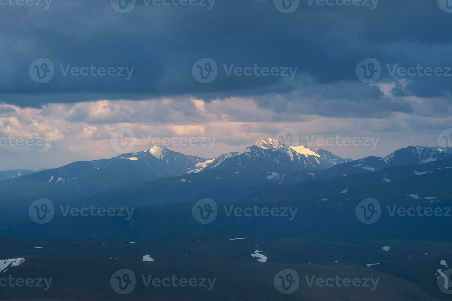 Dawn in the mountains. Colorful nature scenery with sunset or sunrise. Atmospheric landscape with silhouettes of mountains with on background of pink dawn sky. photo