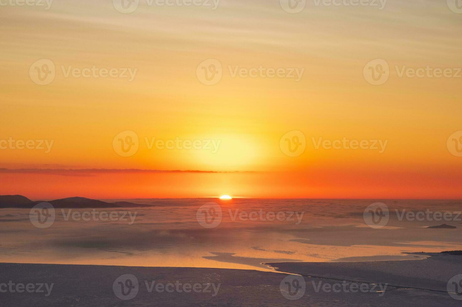 Beginning of sunrise. Colorful sky background concept. Dramatic sunset with twilight colors. Beautiful Arctic sunset. Scenic colorful sky at dawn. Aerial view. photo