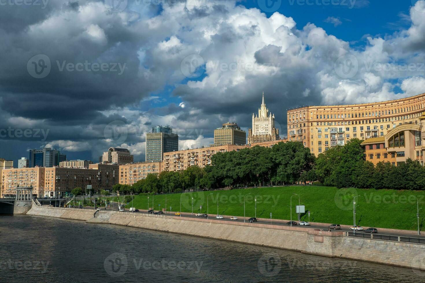 Beautiful Moscow cityscape. Panoramic view of Moscow with beautiful houses on a green hill photo