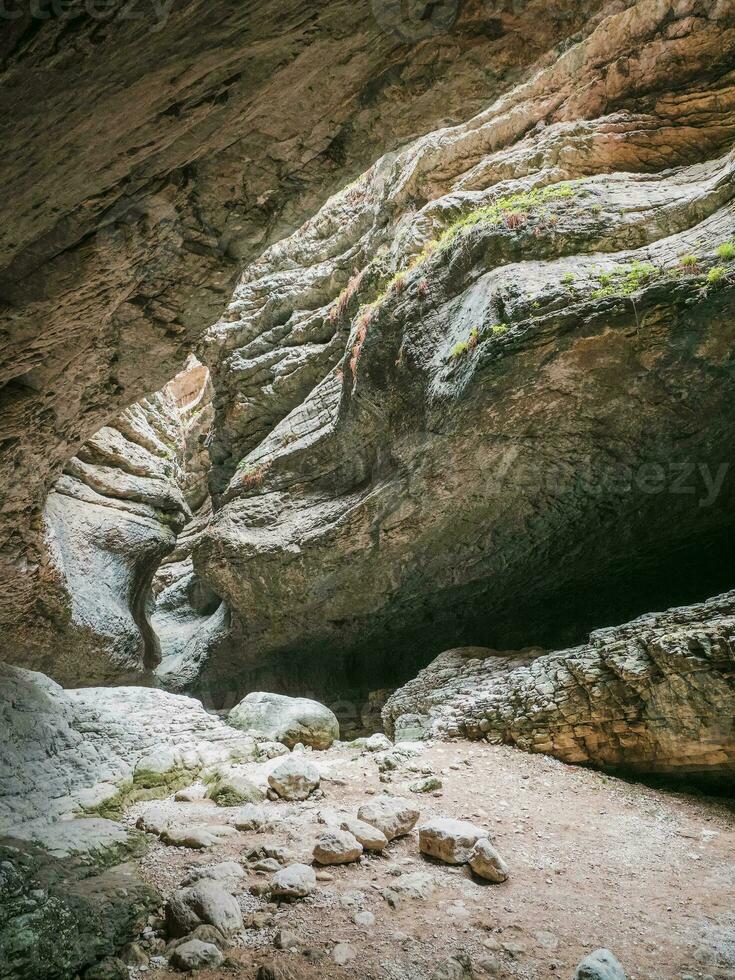 Interesting rocks forming a narrow passage in the Saltinskij gorge. A unique nature reserve in Dagestan. Gorge in mountains landscape nature on Russia. photo