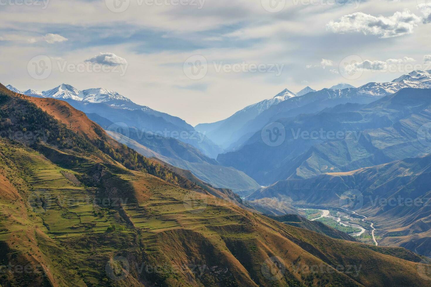 Mountain texture, mountain terrain. Vivid sunset or sunrise scenery with low clouds in mountain valley in soft color. photo