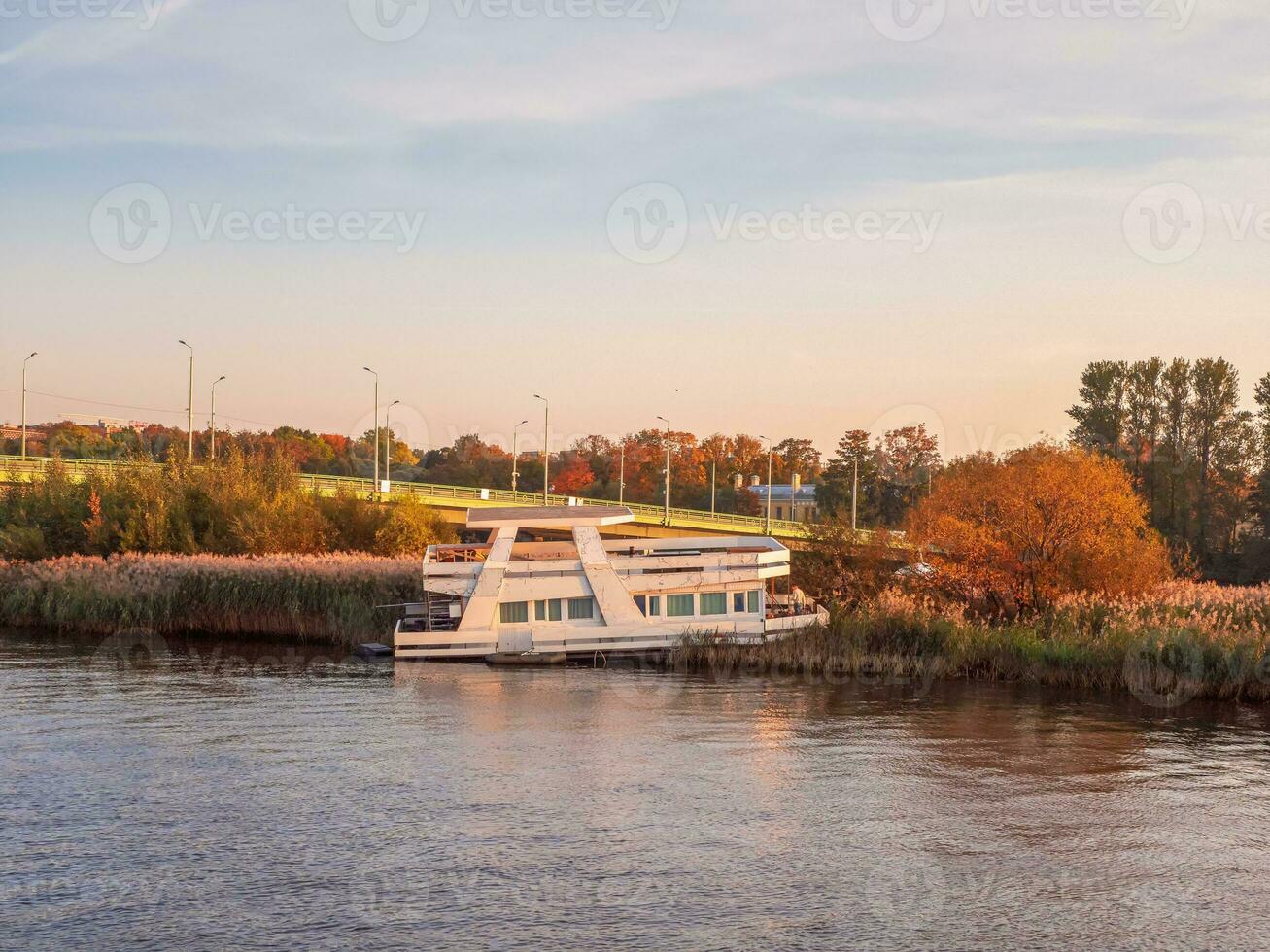 Old river boat ran aground. photo