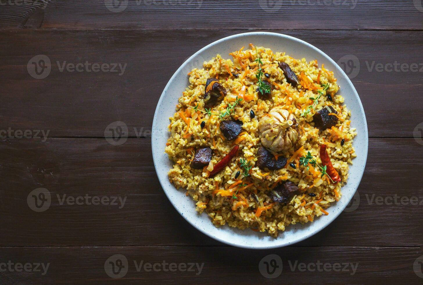 Plate of meat pilaf. Asian dish. photo
