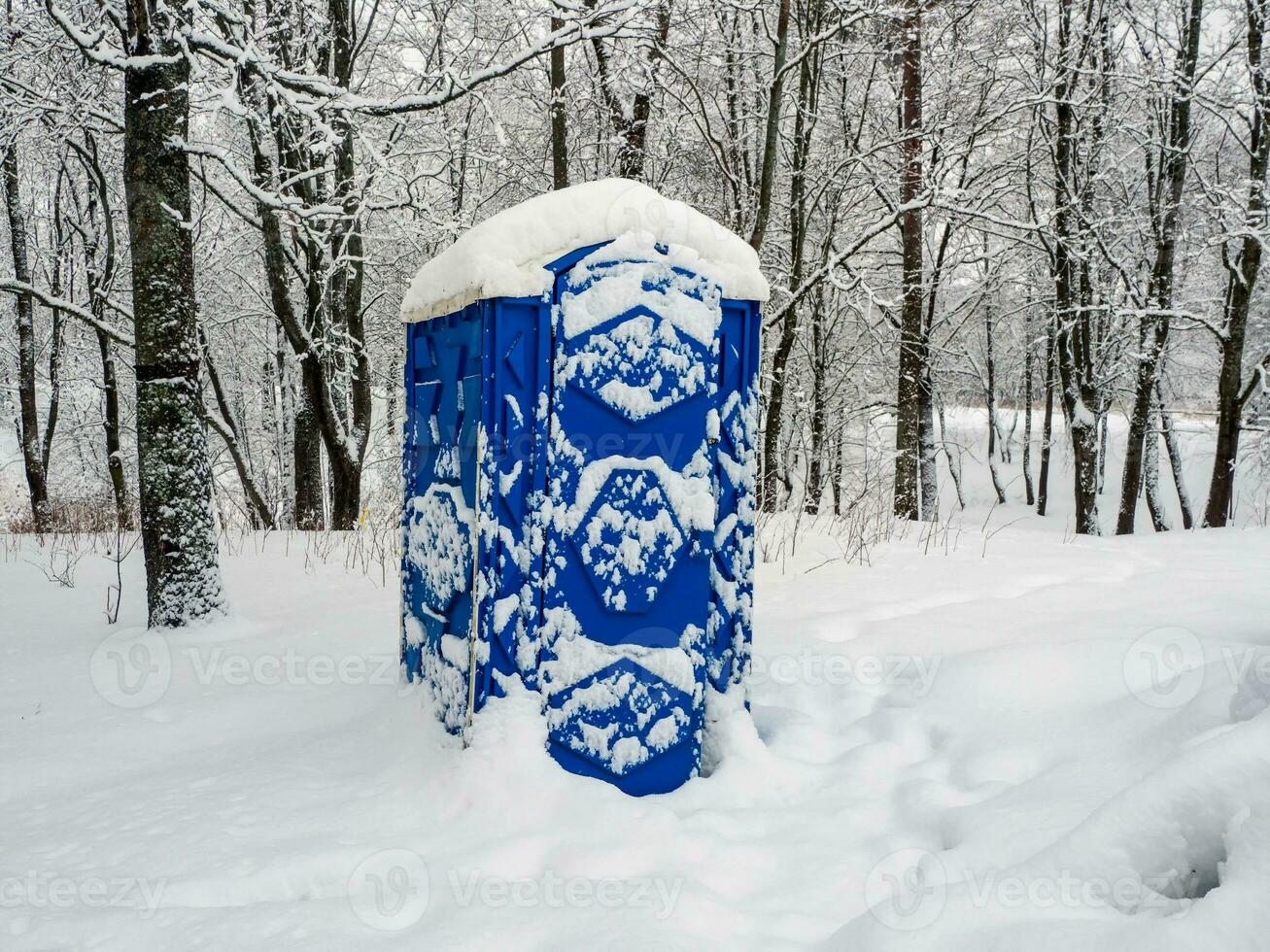 Eco-friendly bio toilet in nature. Outdoor chemical toilet in the winter park. photo