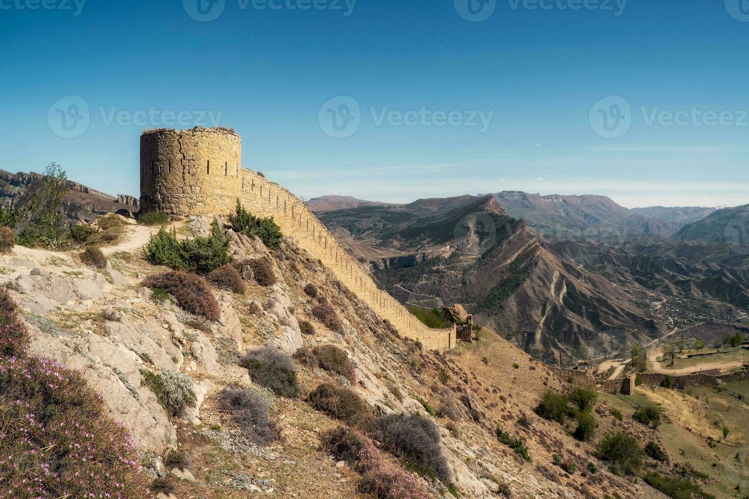 Gunib fortress is a historical monument of Dagestan in sunny spring day. photo