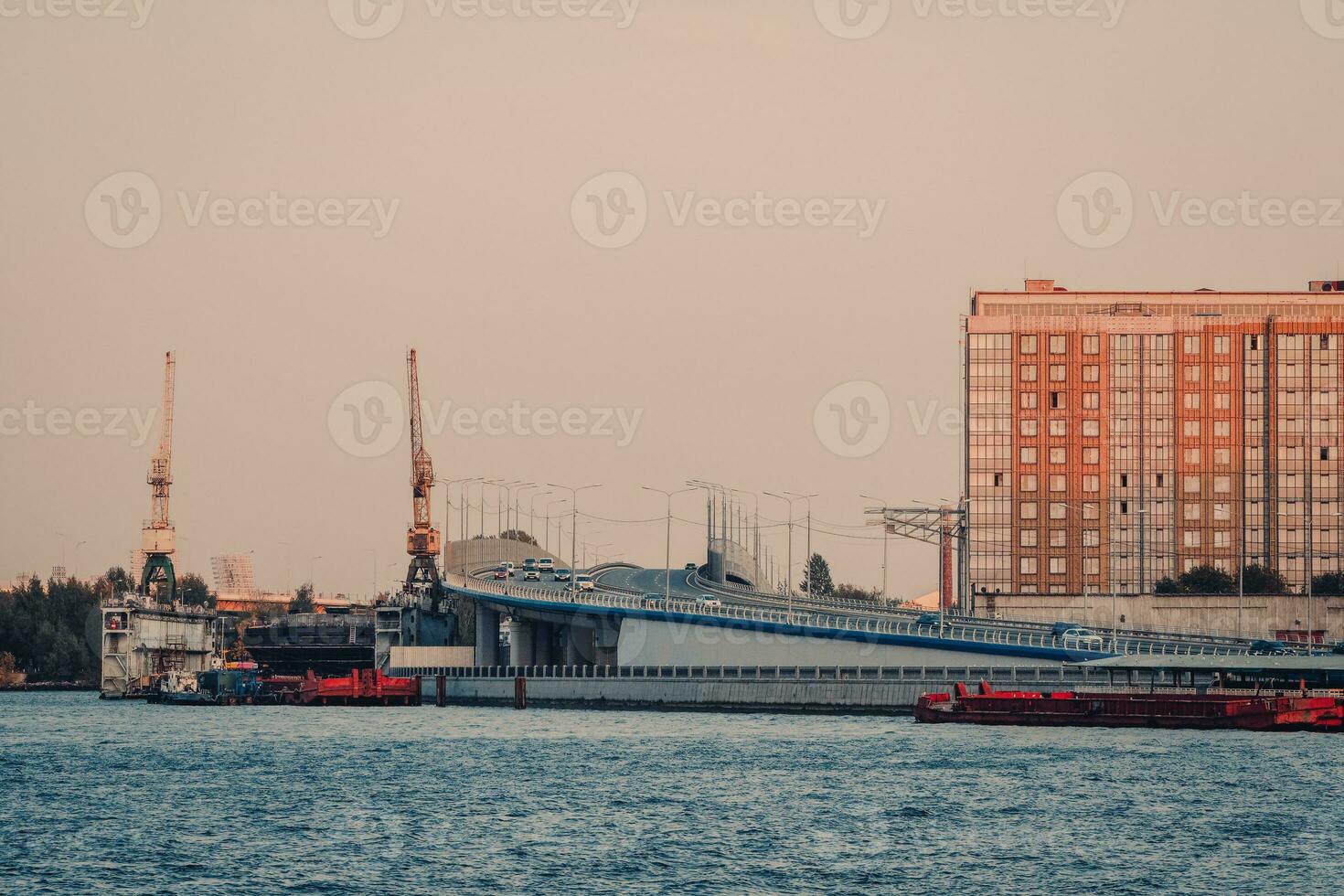 Evening view of St. Petersburg with traffic through the viaduct. photo