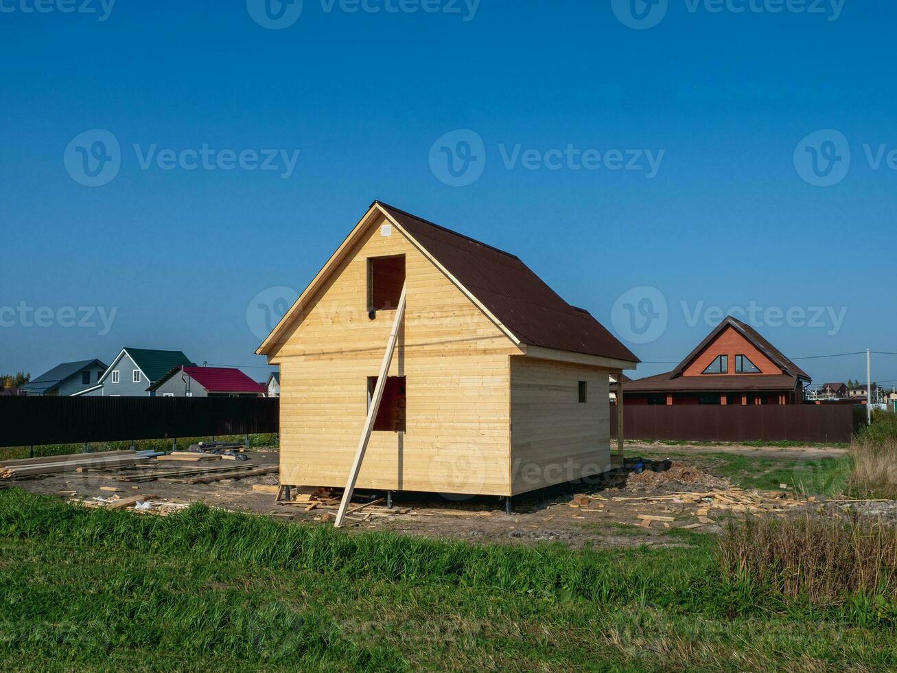 Construction of a wooden house in the village. photo