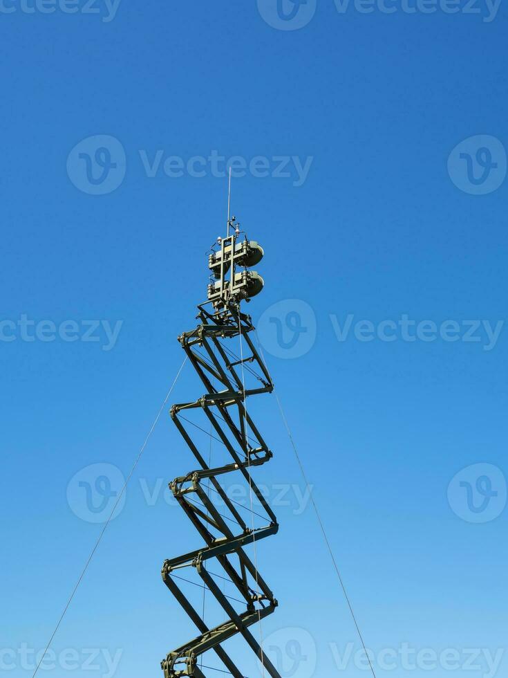 Military antenna on the background of the sky photo