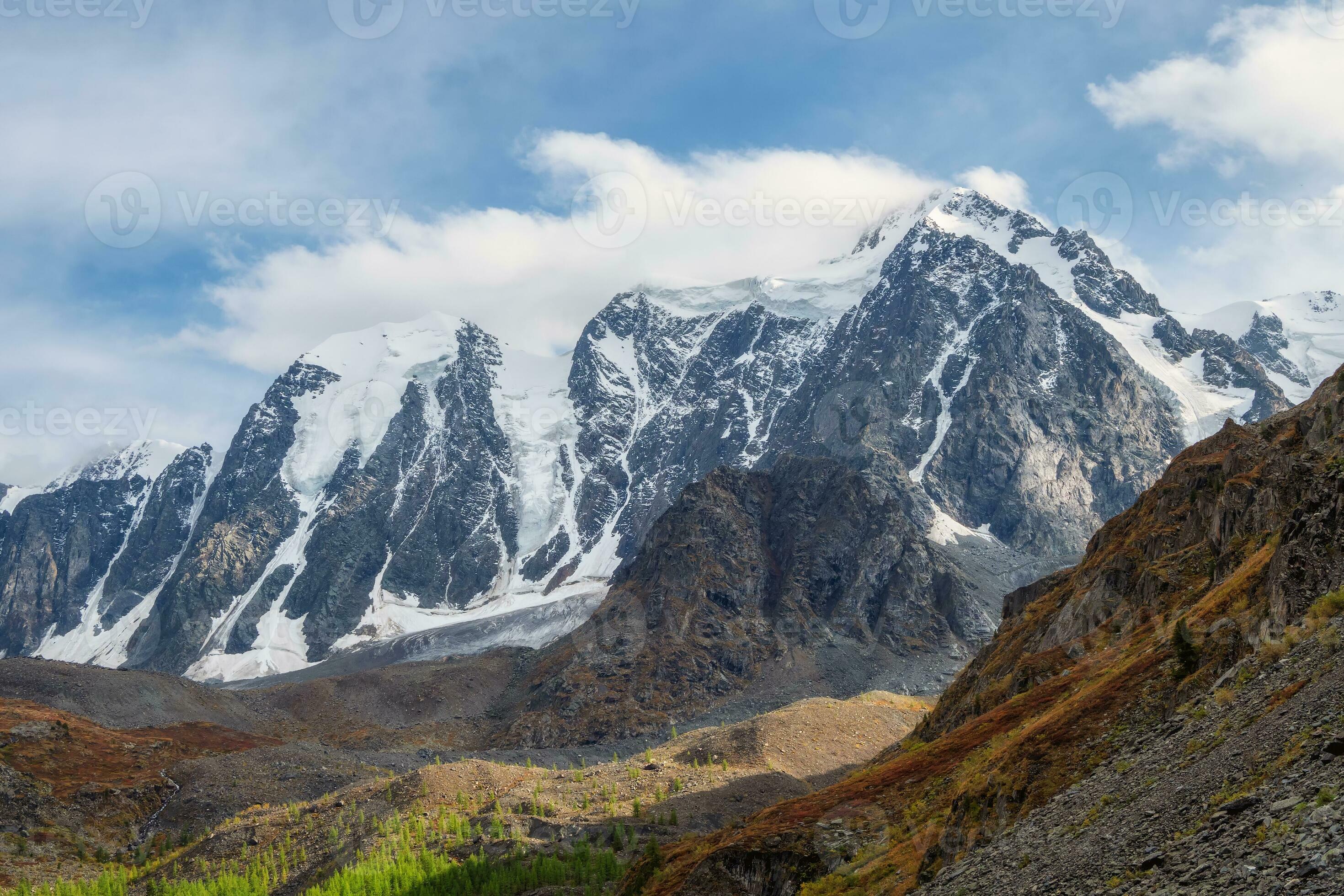Picturesque mountain valley. Atmospheric scenery of snow mountain ridge