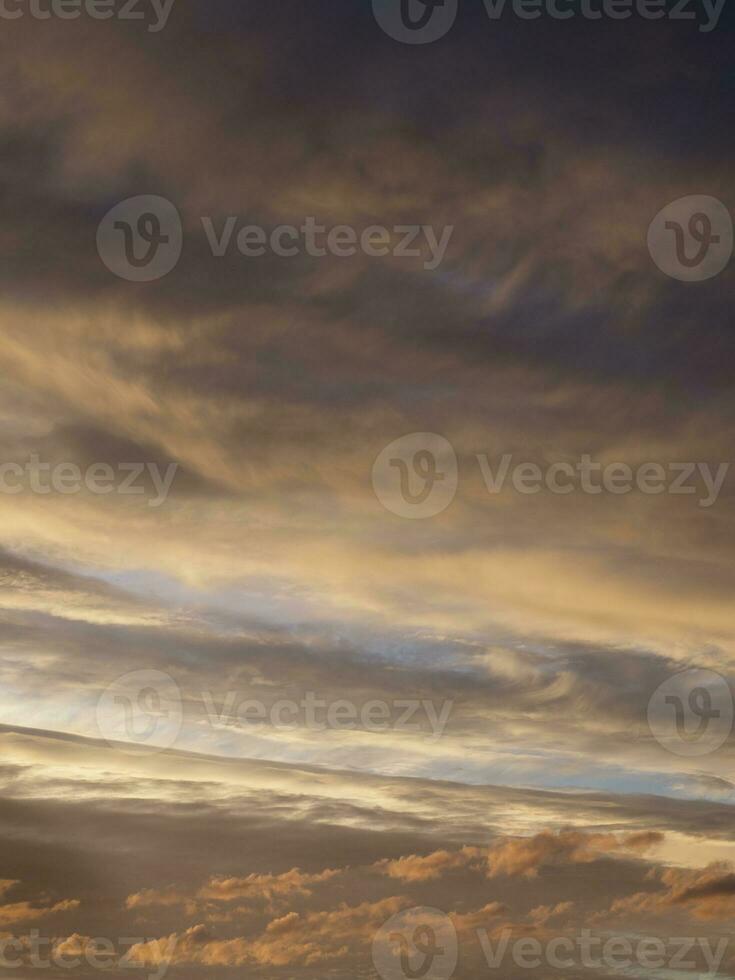 Amazing gradient of the evening sky. Colorful cloudy sky at sunset. Sky texture, abstract nature background, soft focus photo