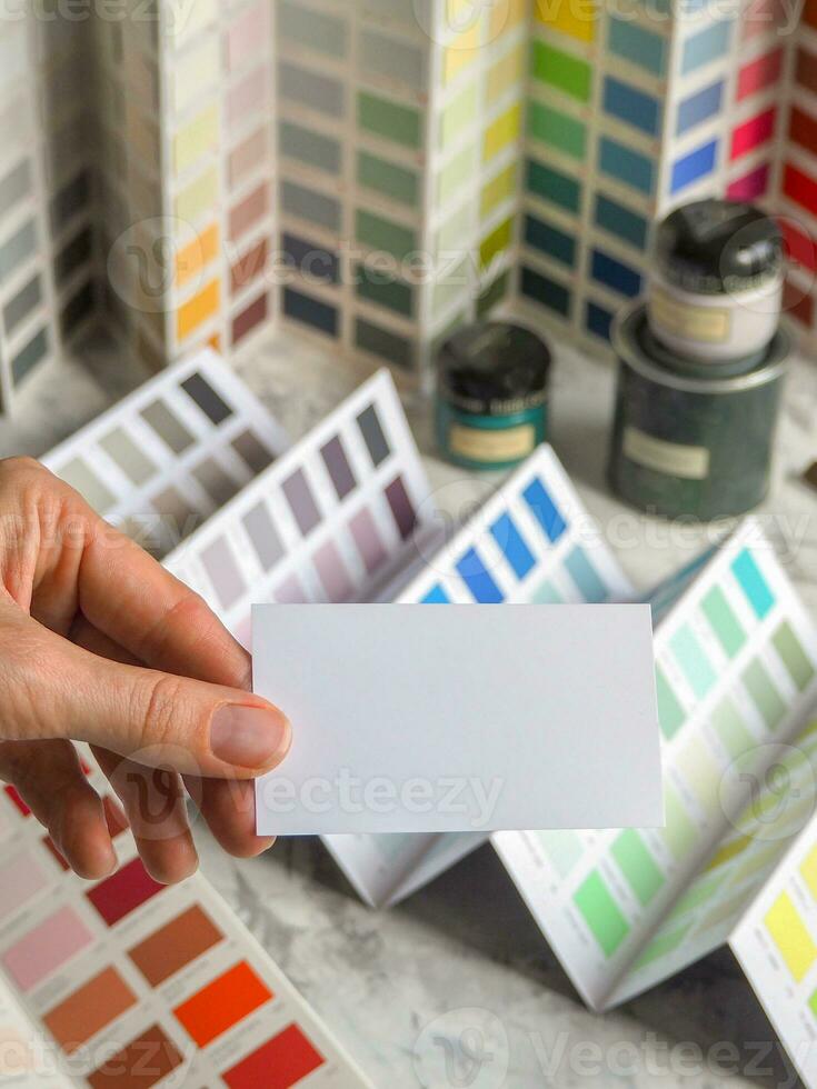 Copy space white business card on a background of colors photo
