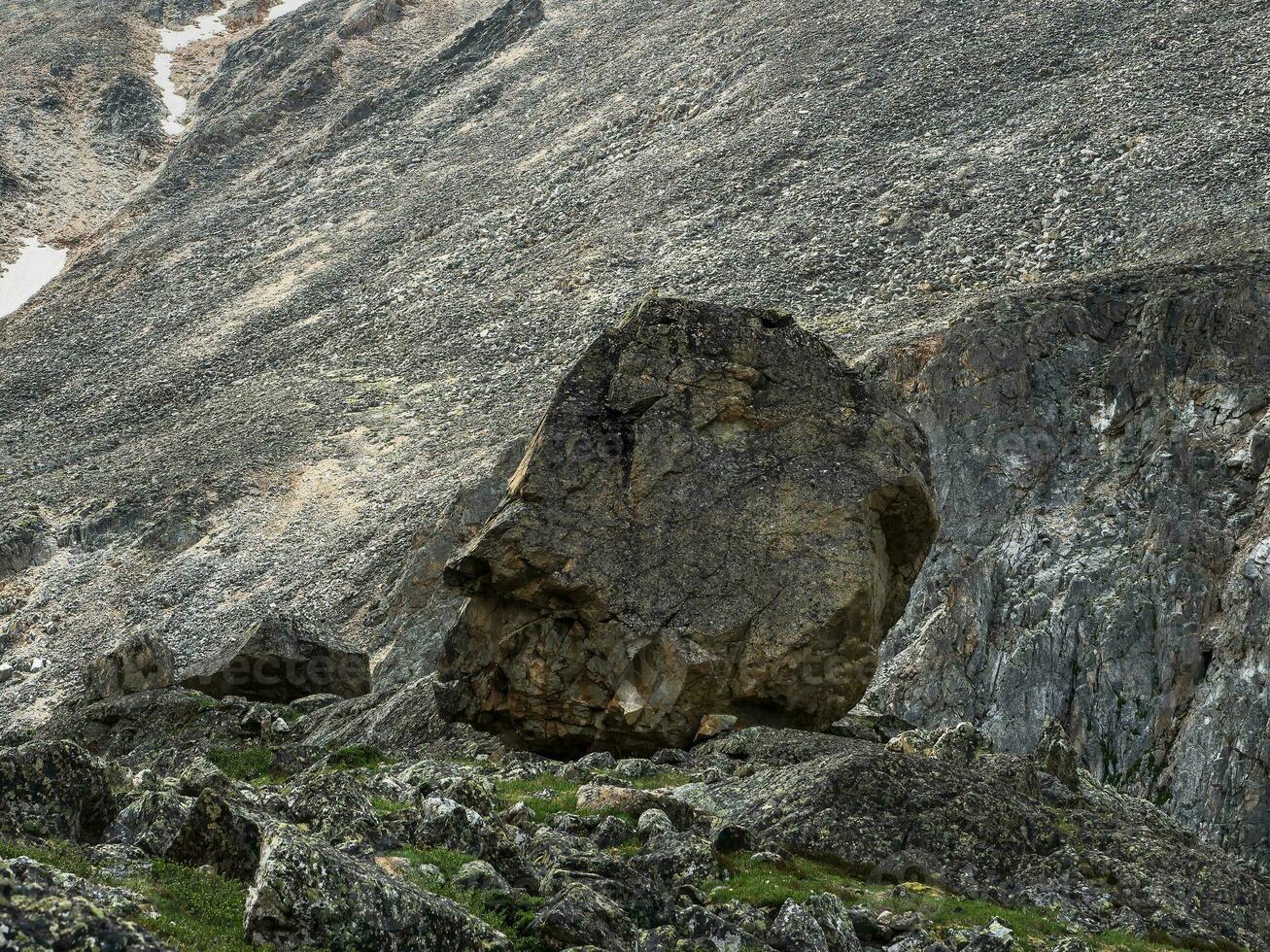 Spirits of the mountains. Natural scary stone head profile. Stone idols, mystical spirits of the mountains locked in stone. Mystical Altai Mountains. Demon in the stone. photo