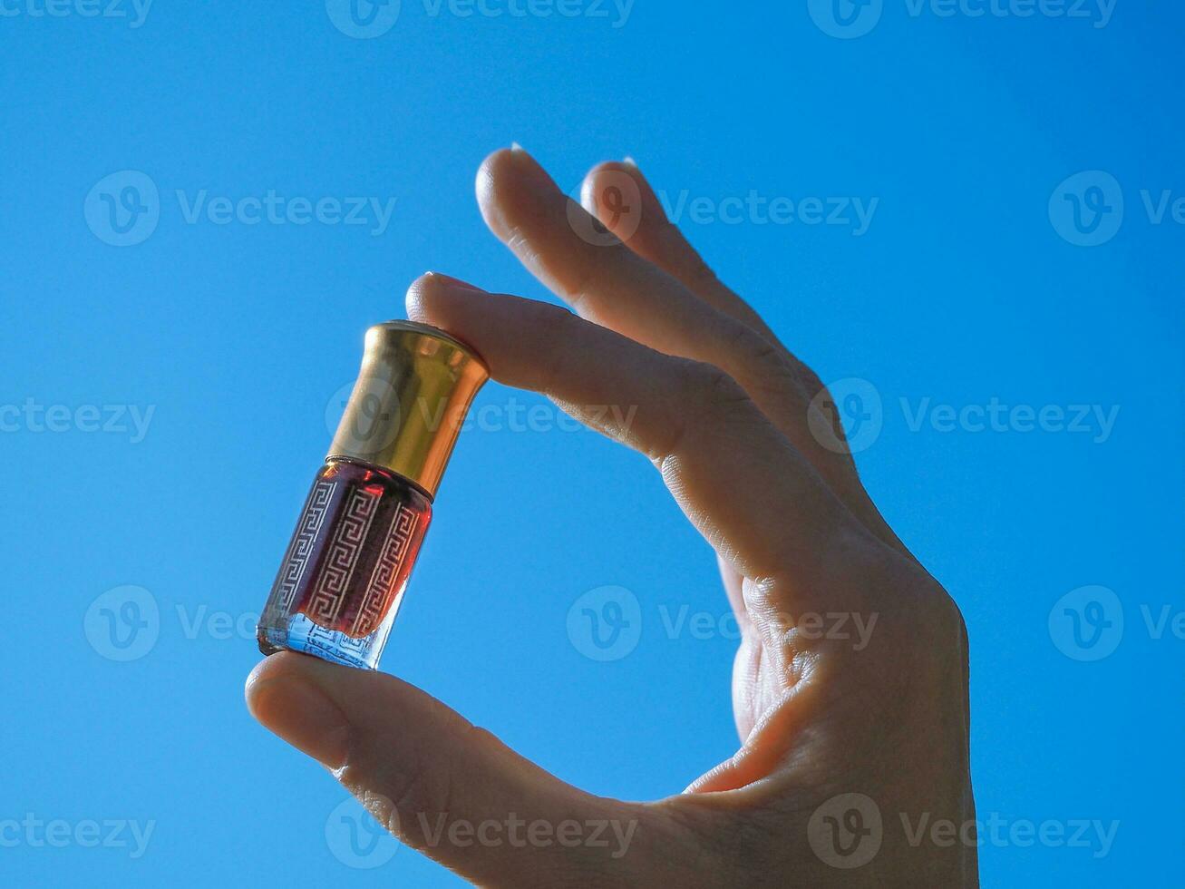 Arab perfume, oil attar in a mini bottle. photo