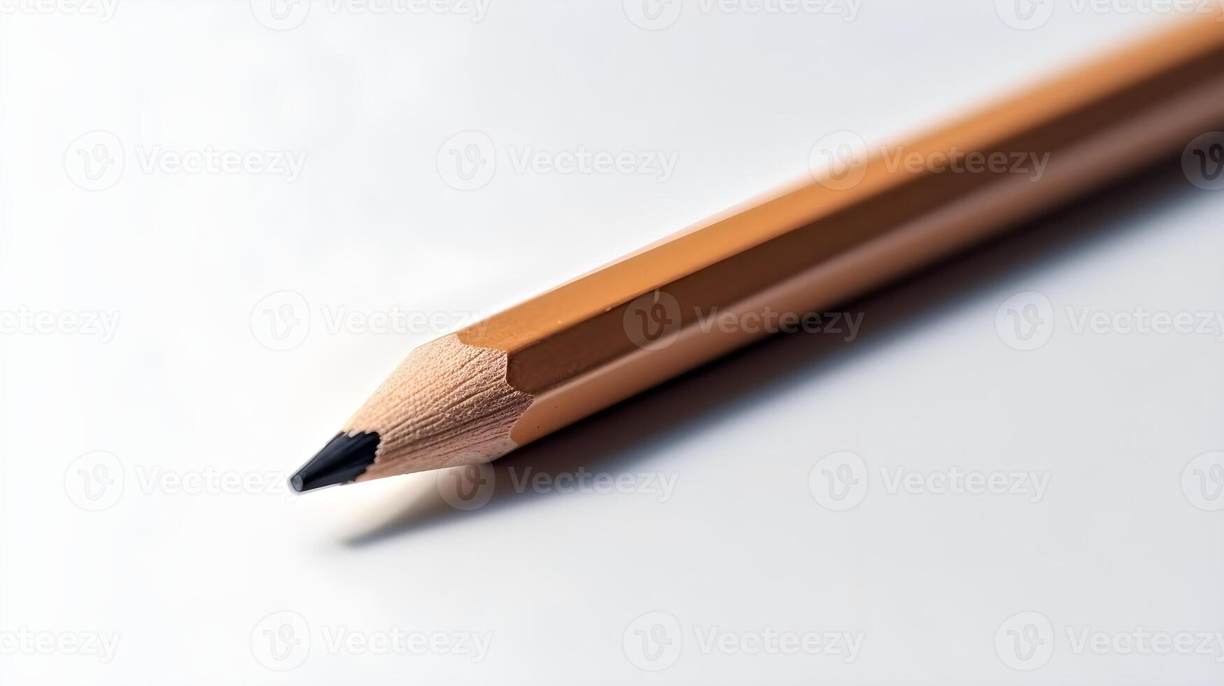 Sharp wooden pencil isolated on white studio shot. photo