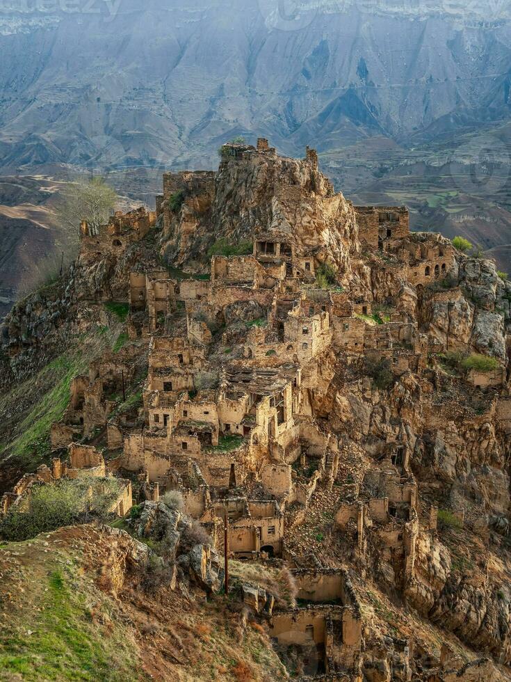 Sights of Dagestan. Abandoned ethnic aul. Old abandoned ghost town of Gamsutl, Dagestan, Russia. photo