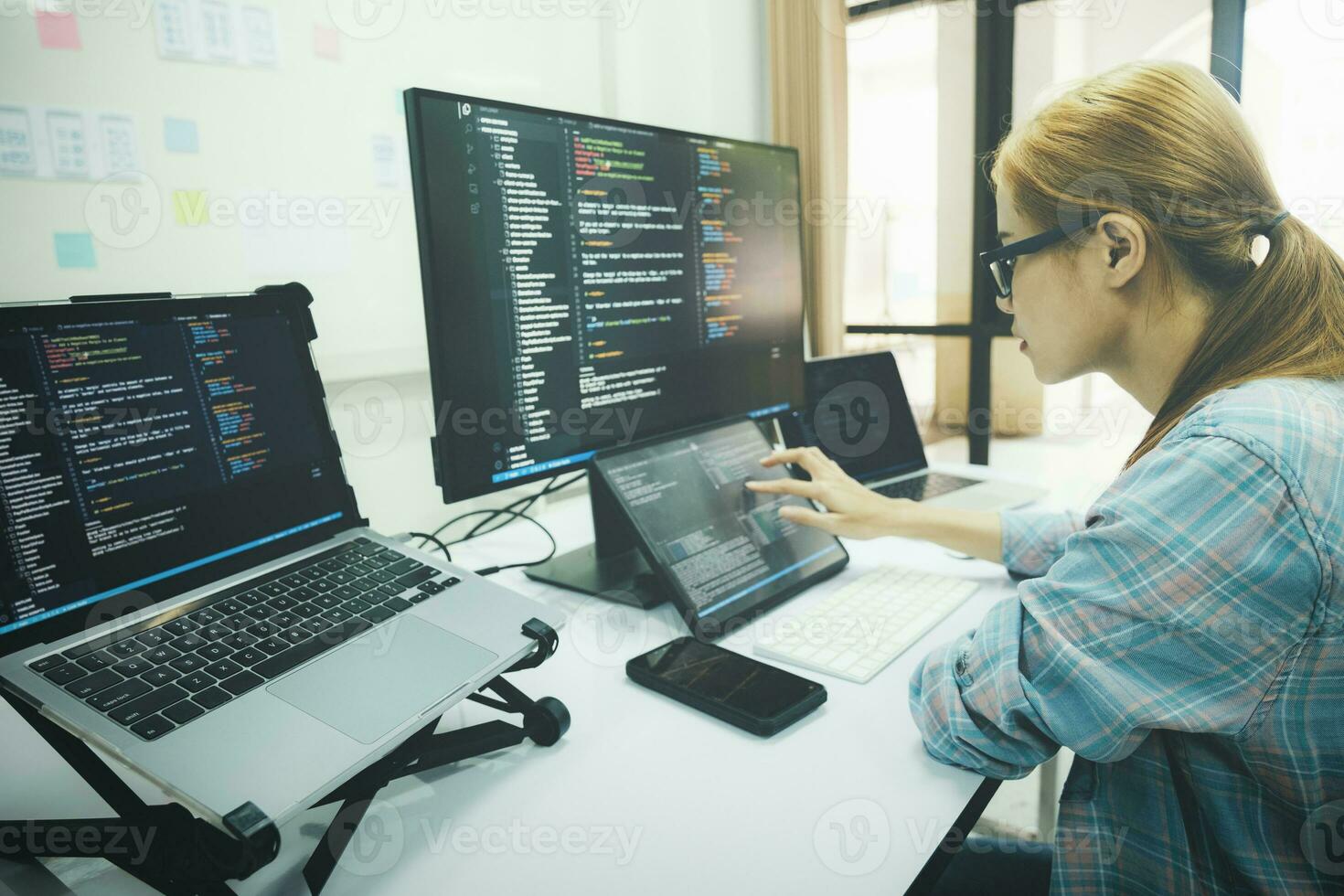 Programmer is coding and programming software. photo