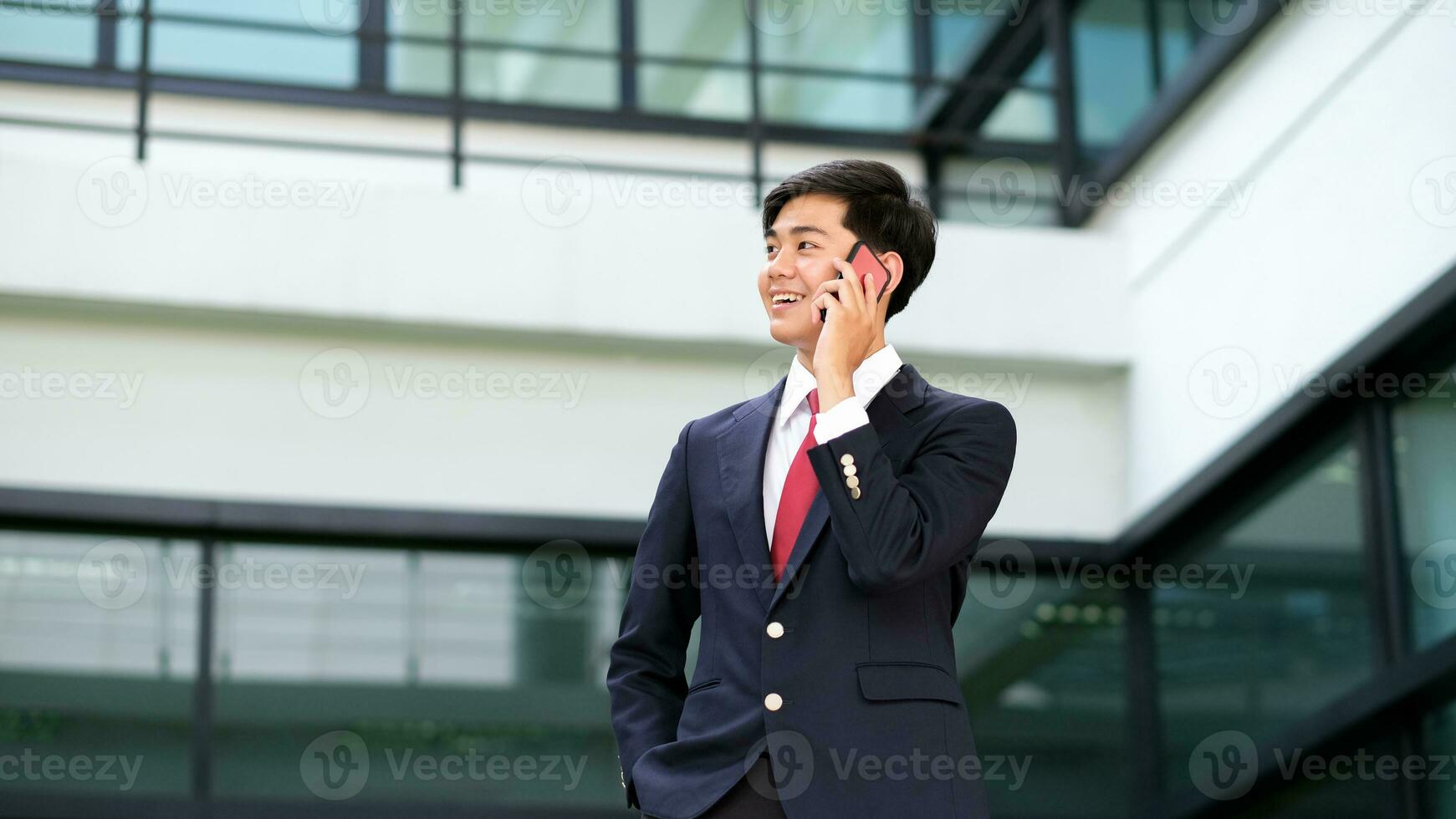 Business man using a cell phone photo