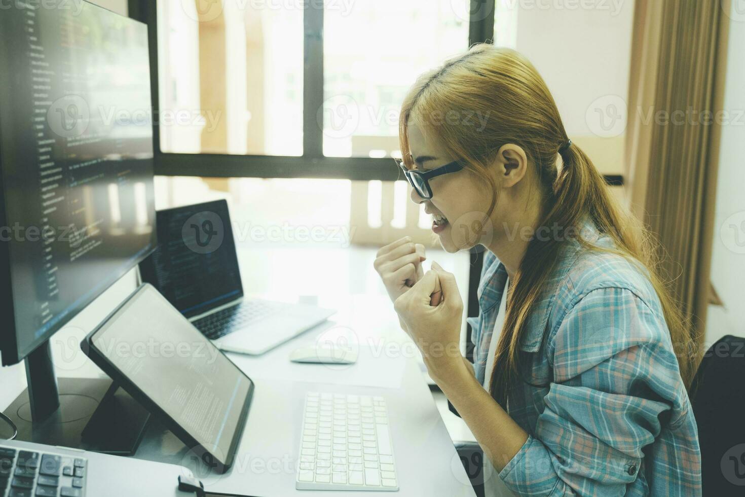 Programmer is coding and programming software. photo