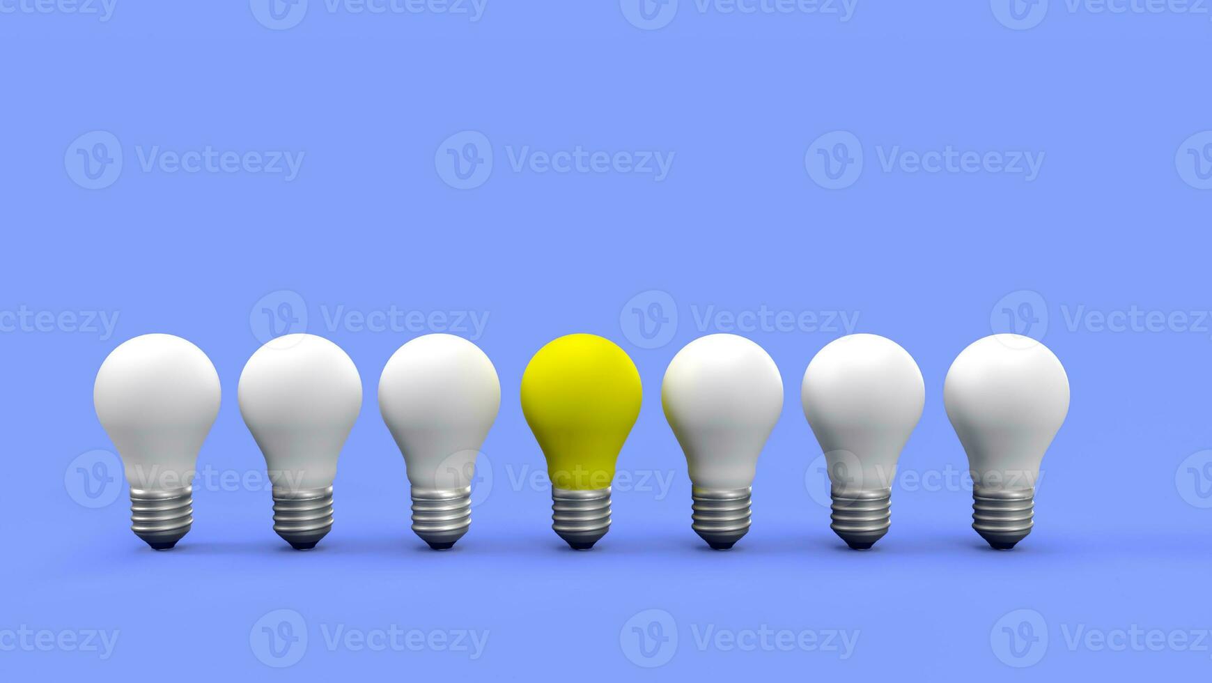 Yellow bulb outstanding on blue pastel background. photo