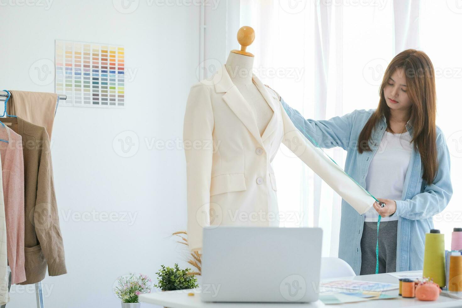 Fashion designer working in studio photo