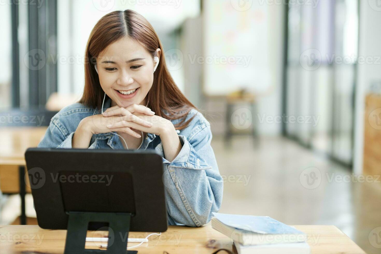 Young woman study in front of the laptop computer at home. photo