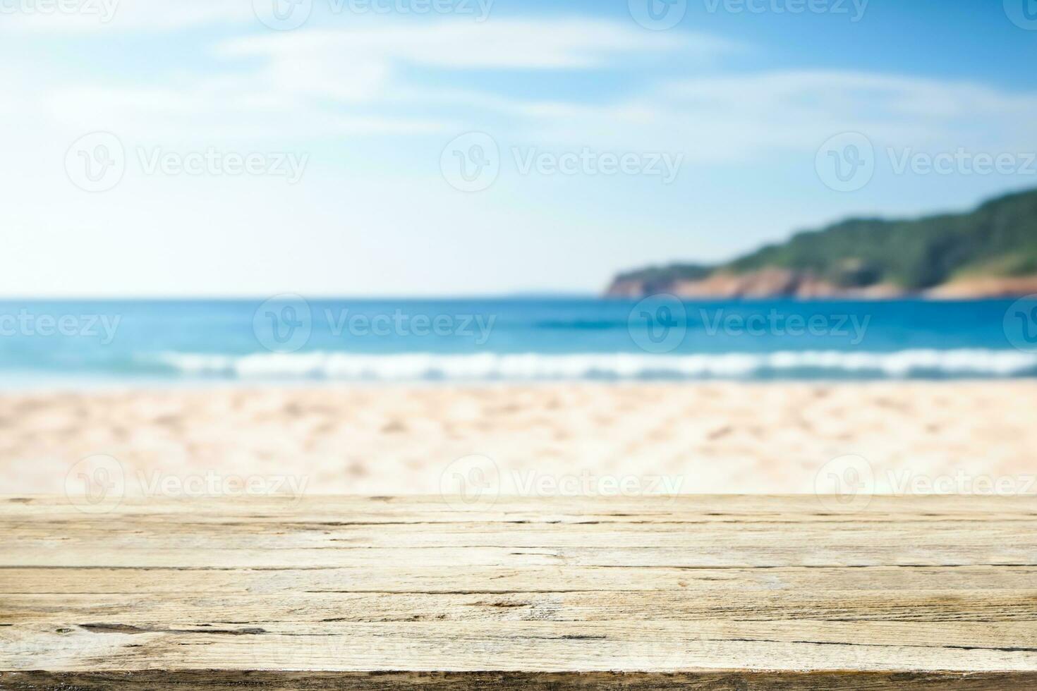 Top of wood table with seascape, blur calm sea and sky at tropical beach background. Empty table ready for your product display montage. photo