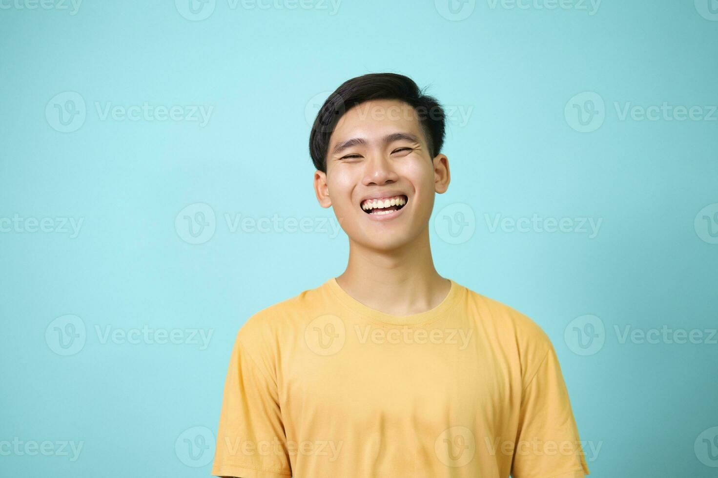 Close up portrait of young smiling handsome guy. photo