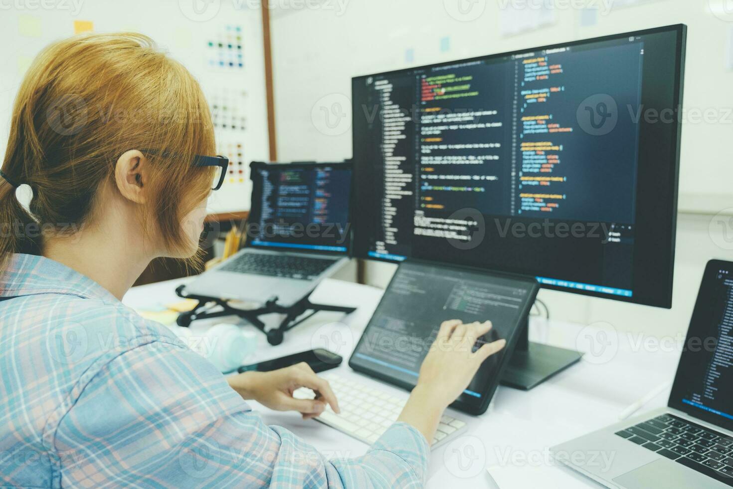 Close up programmer is coding and programming software. photo