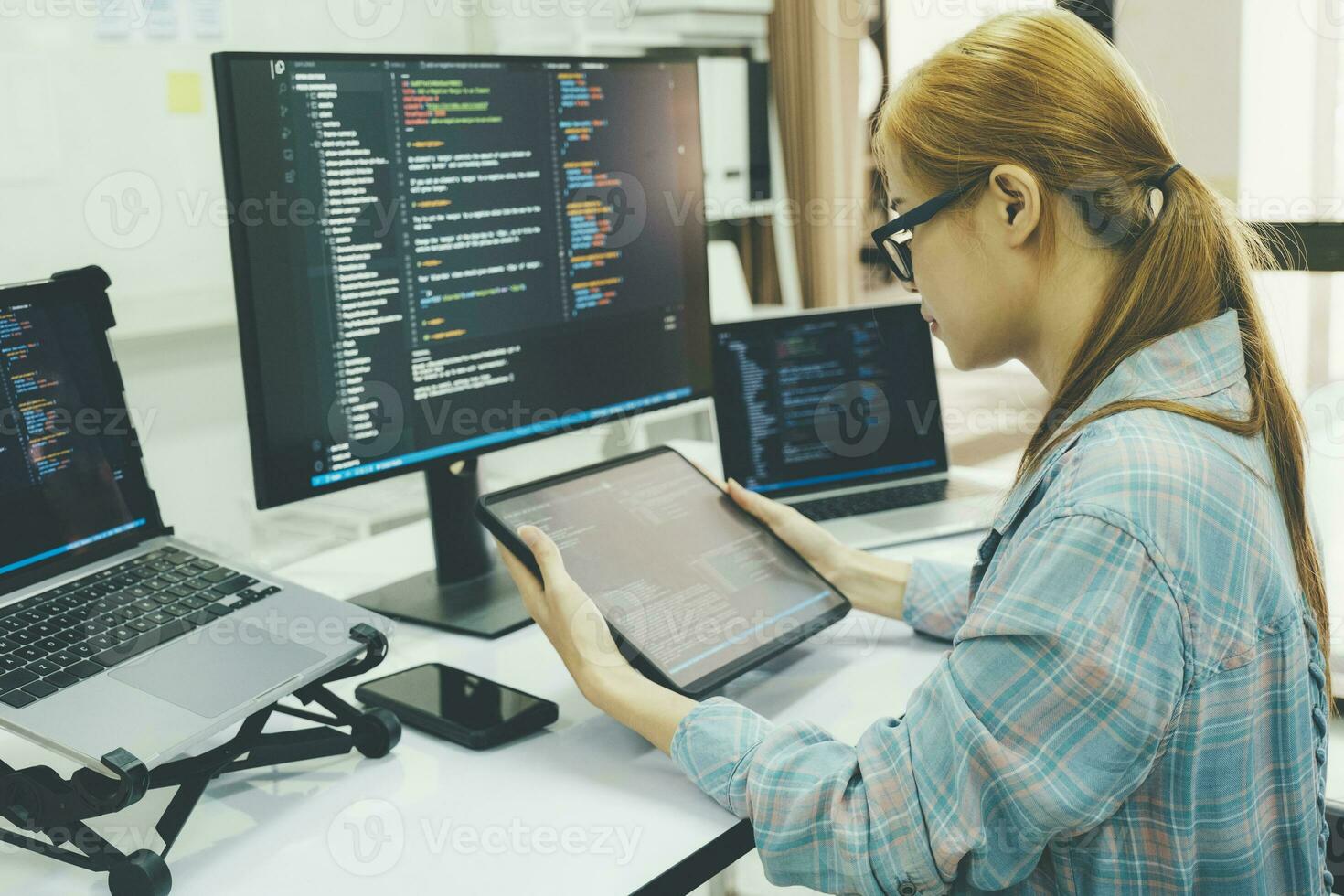 Programmer is coding and programming software. photo