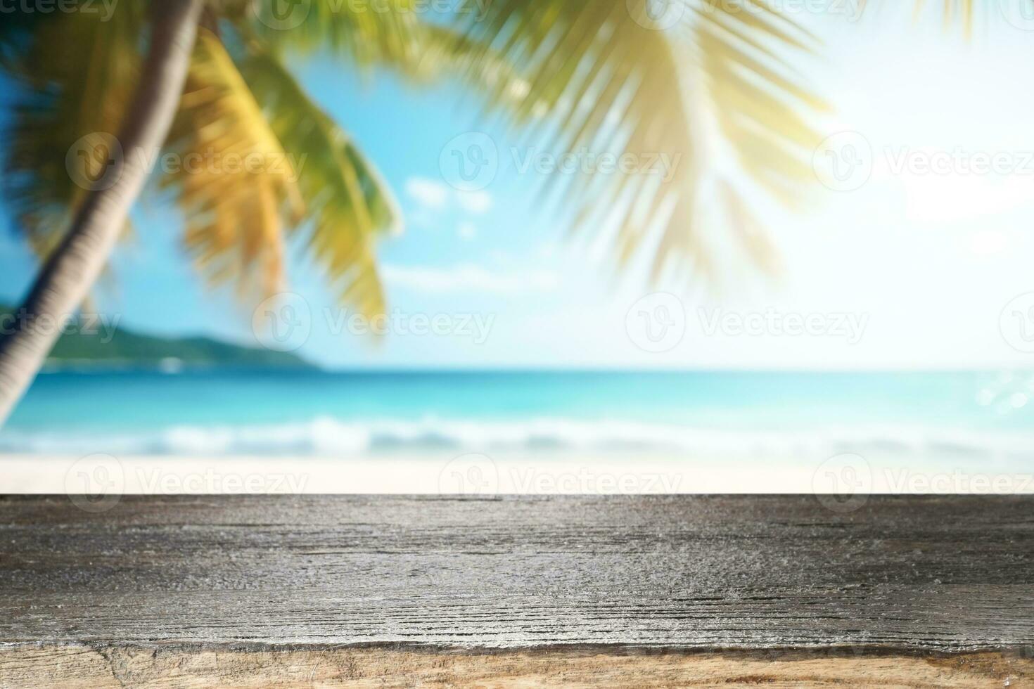Top of wood table with seascape, blur calm sea and sky at tropical beach background. Empty table ready for your product display montage. photo