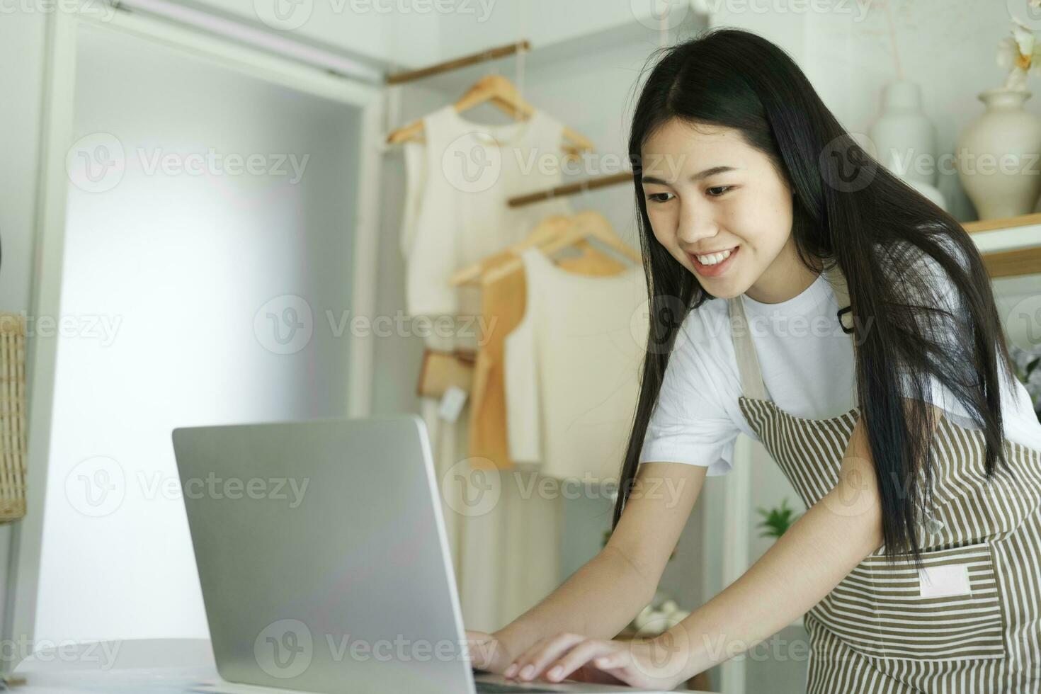Enjoy young businesswoman contact with customers celebrate success or happy pose. photo