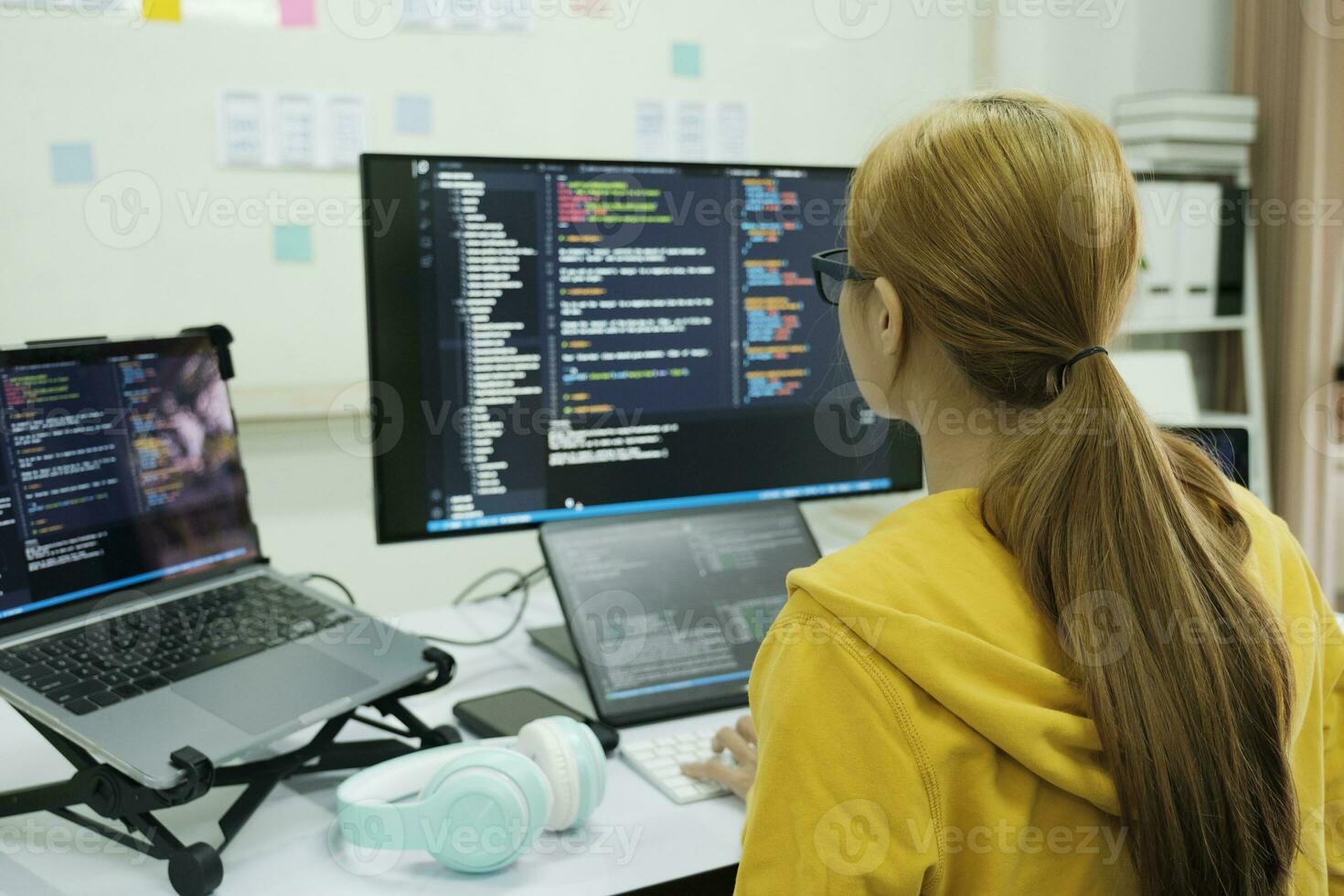 Programmer is coding and programming software. photo